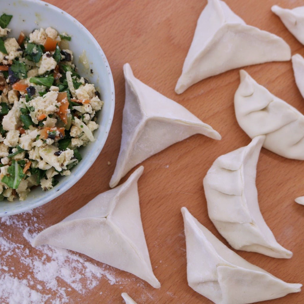 Learn how to fold dumplings...